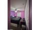 View of bedroom featuring purple walls, ceiling fan, bed, and window at 2019 N 78Th Ave, Phoenix, AZ 85035