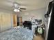 Bedroom with carpet, a ceiling fan and a vanity/desk at 2019 N 78Th Ave, Phoenix, AZ 85035