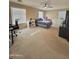 Spacious bedroom with lots of natural light and neutral carpet at 2019 N 78Th Ave, Phoenix, AZ 85035