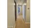 Hallway featuring neutral paint and access to other rooms in the home at 2019 N 78Th Ave, Phoenix, AZ 85035