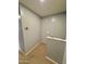 Landing at the top of stairs with neutral carpet and freshly painted neutral walls at 2019 N 78Th Ave, Phoenix, AZ 85035
