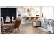 Open concept living and dining room with wood floors and modern decor at 2113 E Glencove St, Mesa, AZ 85213