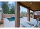 Inviting back patio featuring comfortable lounge chairs overlooking the pool at 2527 W Amber Sun Dr, Phoenix, AZ 85085
