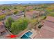 Aerial shot showcases backyard pool and patio area, perfect for outdoor entertaining and relaxation at 2527 W Amber Sun Dr, Phoenix, AZ 85085