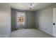 Bedroom featuring a window with a view and neutral carpeting at 2527 W Amber Sun Dr, Phoenix, AZ 85085