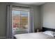 Bedroom featuring a bed and a window with mountain views at 2527 W Amber Sun Dr, Phoenix, AZ 85085