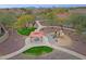 Aerial shot of a community park featuring a playground, picnic area, and walking paths at 2527 W Amber Sun Dr, Phoenix, AZ 85085