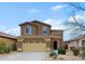 Beautiful two-story home with a manicured lawn and a spacious driveway at 2527 W Amber Sun Dr, Phoenix, AZ 85085
