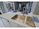 Modern kitchen featuring stainless steel sink, granite countertops, and updated appliances at 2527 W Amber Sun Dr, Phoenix, AZ 85085