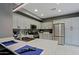 Bright kitchen with granite counters, stainless appliances, and ample cabinet space at 2527 W Amber Sun Dr, Phoenix, AZ 85085