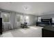 Expansive main bedroom with ample natural light, comfortable seating, and a king bed at 2527 W Amber Sun Dr, Phoenix, AZ 85085