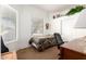 Bright bedroom offers a comfortable bed, a work desk, a large window and ample closet space at 26826 N 66Th Ln, Phoenix, AZ 85083