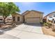 This single Gathering home features a well manicured front yard, desert landscaping and a two car garage at 26826 N 66Th Ln, Phoenix, AZ 85083