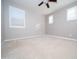 Bedroom featuring soft carpeting, neutral paint and a ceiling fan at 27132 N 81St Ave, Peoria, AZ 85383