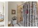 Stylish bathroom with a shower and decorative curtain at 28523 N 162Nd St, Scottsdale, AZ 85262