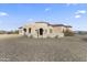 Charming single-story home with desert landscaping and an inviting arched entryway at 28523 N 162Nd St, Scottsdale, AZ 85262