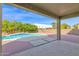 Inviting backyard with a covered patio area and a refreshing pool at 3316 E Kingbird Pl, Chandler, AZ 85286