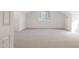Bright bonus room featuring neutral walls and carpeted floors at 3316 E Kingbird Pl, Chandler, AZ 85286