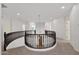 Bright loft features open space, railing detail, and access to several rooms at 3316 E Kingbird Pl, Chandler, AZ 85286