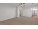 Spacious main bedroom with a bathroom, neutral walls, and soft carpet flooring at 3316 E Kingbird Pl, Chandler, AZ 85286