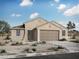 Charming single-story home featuring desert landscaping, a two car garage and modern design accents at 34440 N Timberlake N Mnr, San Tan Valley, AZ 85144