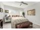 Cozy bedroom with a queen-sized bed, mirrored nightstands, and a plush leather bench at 355 E Thomas Rd # B110, Phoenix, AZ 85012