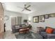 Comfortable living room featuring neutral tones, plush seating, and ample natural light at 355 E Thomas Rd # B110, Phoenix, AZ 85012