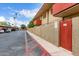 Exterior shot of the parking area with building, featuring ample parking spaces and landscaping with marked fire lane at 355 E Thomas Rd # B110, Phoenix, AZ 85012