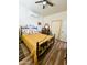 Bedroom with rustic metal bed frame, a ceiling fan, and warm neutral paint at 35524 N 215Th Dr, Wittmann, AZ 85361