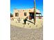 Desert home featuring native landscaping, including cacti and desert flora for low-maintenance beauty at 35524 N 215Th Dr, Wittmann, AZ 85361