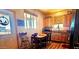 Inviting kitchen with wooden cabinets, stainless appliances, and a dining area perfect for Gathering meals at 35524 N 215Th Dr, Wittmann, AZ 85361