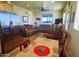 Cozy living room with comfortable seating, natural light, and an inviting atmosphere for relaxation and entertainment at 35524 N 215Th Dr, Wittmann, AZ 85361