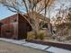 Modern home featuring unique architectural design, desert landscaping, and a gravel driveway at 37 E Foothill Dr, Phoenix, AZ 85020