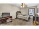 Cozy bedroom featuring a ceiling fan, neutral walls, and a comfortable bed at 4010 E Grandview St, Mesa, AZ 85205