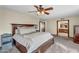 Spacious bedroom with a king-size bed, walk-in closet, and bathroom access for added convenience at 4010 E Grandview St, Mesa, AZ 85205