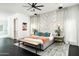 Stylishly decorated main bedroom with elegant headboard and accent pillows at 4219 N 41St Pl, Phoenix, AZ 85018