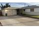 View of the house, showing the driveway and entrance, and the house number is visible at 4738 W Clarendon Ave, Phoenix, AZ 85031