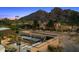 Stunning home with a backyard oasis including pool, patio area and mountain views in the background at 4900 E Arroyo Verde Dr, Paradise Valley, AZ 85253