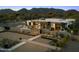 Expansive aerial view of the stunning property showcasing desert landscaping and mountain views at 4900 E Arroyo Verde Dr, Paradise Valley, AZ 85253