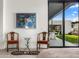 Stylish bedroom showcasing Asian-inspired décor and serene backyard view from large sliding doors at 4900 E Arroyo Verde Dr, Paradise Valley, AZ 85253