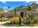 Landscaped front yard showcasing desert plants, block privacy wall and mountain views at 4900 E Arroyo Verde Dr, Paradise Valley, AZ 85253