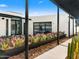 Modern home exterior with desert landscaping and a walkway leading to the entrance at 4900 E Arroyo Verde Dr, Paradise Valley, AZ 85253