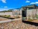 Stylish front yard featuring a desert landscape, block privacy wall, and an artistic gated entry at 4900 E Arroyo Verde Dr, Paradise Valley, AZ 85253