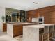 Contemporary kitchen with dual islands, stainless steel appliances, and sleek marble countertops at 4900 E Arroyo Verde Dr, Paradise Valley, AZ 85253