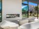 Stylish outdoor seating area with a fireplace and mountain views, perfect for relaxing and entertaining in a contemporary setting at 4900 E Arroyo Verde Dr, Paradise Valley, AZ 85253