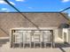 Outdoor kitchen featuring a built-in grill, bar seating, and a sleek design, perfect for outdoor entertaining and culinary experiences at 4900 E Arroyo Verde Dr, Paradise Valley, AZ 85253
