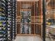 Custom built wine cellar with wooden racks and temperature control at 4900 E Arroyo Verde Dr, Paradise Valley, AZ 85253
