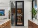 Climate controlled glass enclosed wine cellar at 4900 E Arroyo Verde Dr, Paradise Valley, AZ 85253