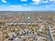 Neighborhood aerial view showcasing desert landscaping, tile roofs, blue skies and mountain views in distance at 5323 E Thunder Hawk E Rd, Cave Creek, AZ 85331