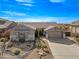 Attractive exterior elevation of home showing xeriscaping, desert landscaping, and front entrance at 5323 E Thunder Hawk E Rd, Cave Creek, AZ 85331